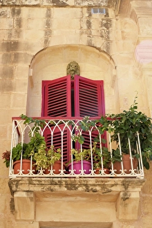Malta Prints: Mdina, Malta. Beautiful rose colored shutters on a window found on the streets of Mdina