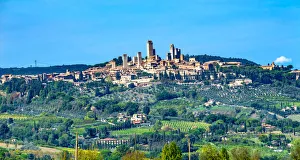 Renaissance Prints: Medieval town of San Gimignano, Tuscany, Italy. Vineyards fields and hill town