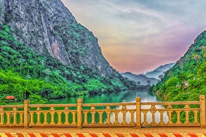 Mekong River Prints: Mekong River, Laos. Landscape view of sunset from a bridge over the Mekong River