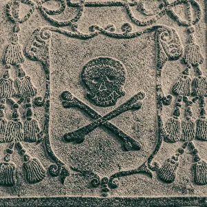 Bas Relief Prints: Melaka, West Malaysia. Skull and crossbones stone carving on old Portuguese tombstones in Melaka's ruined St