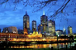 Sky Scraper Prints: Melbourne, Australia. A nighttime view of the lights and buildings around the river