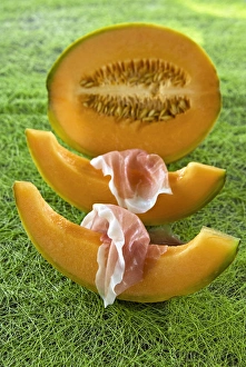 Antipasto Prints: Melon wedges (Cucumis melo) and ham, italian gastronomy