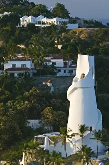 Images Dated 9th December 2006: Mexico, Colima, Manzanillo. Brisas Las Hadas Resort Water Tower / Sunrise