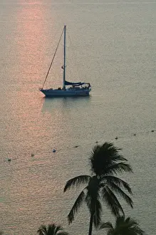 Images Dated 8th December 2006: Mexico, Colima, Manzanillo. Manzanillo Bay / Sailboat at Sunrise