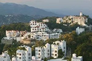 Images Dated 8th December 2006: Mexico, Colima, Manzanillo. Peninsula de Santiago Condominiums / Dusk