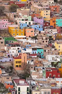 Homes Prints: Mexico, Guanajuato. Colorful homes perch on the hillside of this Mexican town