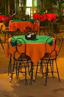 Mexico, Guerrero, Ixtapa. Cafe Table / Evening
