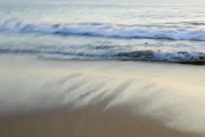 Mexico, Guerrero, Ixtapa. Playa del Palmar Wave / Dusk