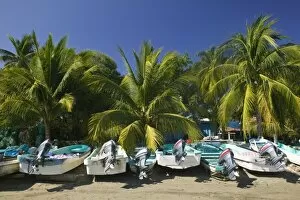 Mexico, Guerrero, Zihuatanejo. Fishing Boats on Playa Municipal Beach