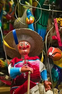 Mexico, Guerrero, Zihuatanejo. Mexican Puppets at the Tourist Market
