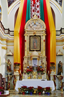 Mexico, Jalisco, Puerto Vallarta. Altar of Our Lady of Guadalupe church. Credit as