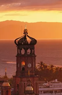 Images Dated 26th April 2004: Mexico, Jalisco, Puerto Vallarta. Church tower at sunset (Nuestra Senora de Guadalupe