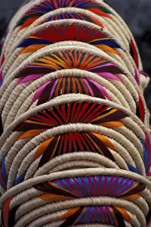 For Sale Prints: Mexico, Oaxaca. Colorful straw and woven handicrafts (baskets) from Jamiltepex Village