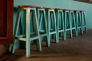 Retro Prints: Mexico, Oaxaca, Green Bar Stools line wall inside Roof Top Cafe near the Iglesia de Santo Domingo