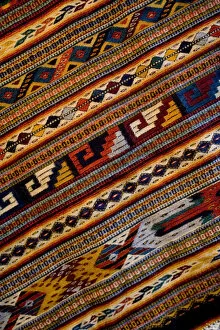 Mexico, Oaxaca, Detail of hand-woven rug using Zapotec Indian design displayed at