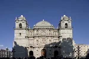 Mexico, Oaxaca, Setting sun lights Cathedral of the Virgin of the Assumption along