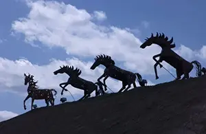 Roof Top Prints: Mexico, Playa Del Carmen, decorative horses above shopping area