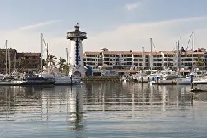 Images Dated 8th November 2010: Mexico, Puerto Vallarta. Lighthouse in Marina Vallarta, Puerto Vallarta, Mexico