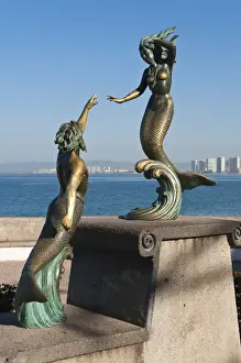 Images Dated 10th November 2010: Mexico, Puerto Vallarta. Triton and Nereida sculpture on the Malecon, Puerto Vallarta