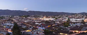 Mexico, San Cristobal de Las Casas. Dusk falls over the city in this panorama Mexico, San Cristobal de Las Casas. Dusk falls over the city in this panorama
