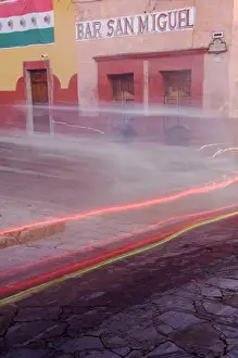 Mexico, San Miguel de Allende, Bar San Miguel entrance with car taillights. Credit as