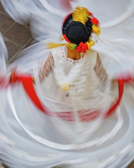 One Person Prints: Mexico, San Miguel de Allende. Blurred motion view of woman dancing