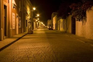 Mexico, Yucatan, Valladolid. Street scene at night in the town of Valladolid