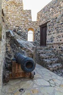 Cannon Prints: Middle East, Arabian Peninsula, Oman, Muscat, Muttrah. Ancient cannon at Muttrah Fort