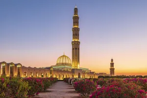 Images Dated 9th March 2021: Middle East, Arabian Peninsula, Oman, Muscat. Sunset view of the Sultan Qaboos Grand