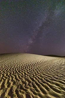 Prints of Middle East, Arabian Peninsula, Ash Sharqiyah North, Bidiyah. Stars over a sand dune in the desert of Oman Asia Prints: Middle East, Arabian Peninsula, Ash Sharqiyah North, Bidiyah