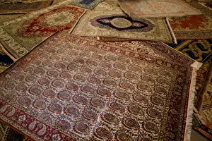 Carpet Prints: Middle East central part of Turkey in Cappadocia with Turkish Rugs on display for