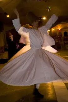 Dancing Prints: Middle East central part of Turkey in Cappadocia Whirling Dervishes dancing in underground