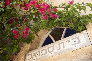 Middle East, Israel, Tel Aviv, Old Jaffa, mosaic Hebrew sign and stained glass window above door