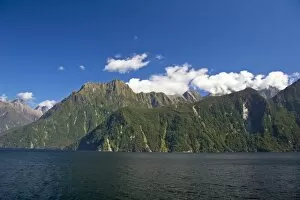 Milford Sound, New Zealand. An afternoon cruise through Milford sound is a popular activity