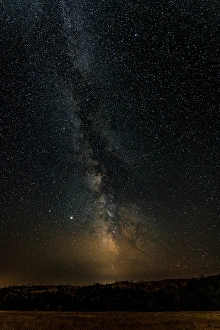 Images Dated 2025: The Milky Way dominates the stary summer sky over Custer State Park in South Dakota
