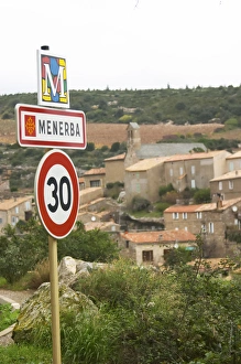 Signpost Prints: Minerve village Menerba Minervois. Languedoc. Road sign with the name of the village