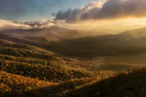 Misty autumn sunrise and Blue Ridge Mountains from Blue Ridge Parkway from Pounding