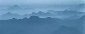 Misty blue ridges retreat into the mist in the Cascade Mountains
