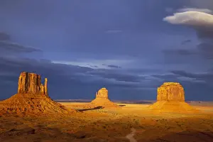 Navajo Prints: The Mittens and Merrick Buttes at sunset in Monument Valley Navajo Tribal Park on the Arizona