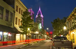 Downtown Prints: Mobile Alabama downtown traffic on Dauphin Street at twilight with Trustmark Skyscrapper