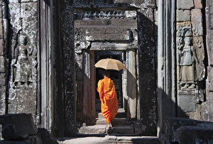 Robe Prints: Monk with Buddhist statues in Banteay Kdei, UNESCO World Heritage site