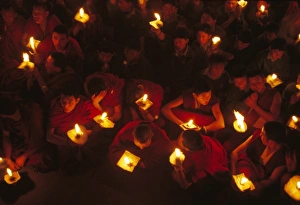 Tibetan Prints: Monks demonstrate a protest with candles
