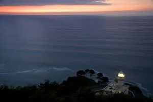 Images Dated 27th August 2008: Monte Igueldo Lighthouse at sunset in La Concha Bay near the city of Donostia-San Sebastian