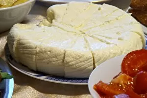 Montenegrin food speciality: fresh sheep cheese cut in triangles on a plate. Durovic Jovo Winery