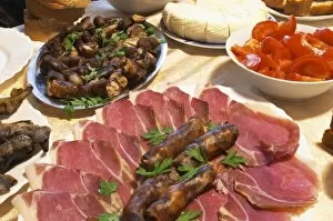 Montenegrin food speciality: Smoked and dry cured ham and smoked sausages. Durovic Jovo Winery