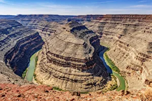 Images Dated 16th July 2021: Monument Valley, Utah. San Juan River running through three sinuous canyons and valleys