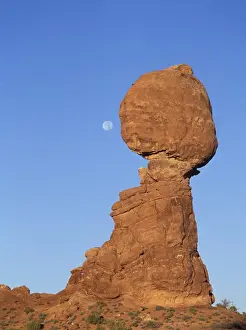 Landform Prints: Full moon descending above Balancing Rock in Arches National Park, Utah