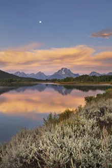 Still Prints: Full moon, orange clouds at Oxbow Bend at sunrise, Grand Teton National Park, Wyoming