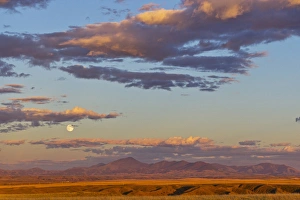 Moonrise Prints: Full moon rises above the Highwood Mountains near Great Falls, Montana, USA