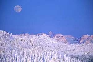 Horizon Over Land Prints: Full moon rising above Glacier National Park Peaks from summit of Big Mountain in